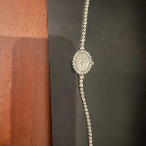 Diamond watch tennis bracelet